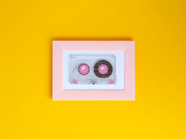 Free photo vibrant clear cassette tape with vivid background color