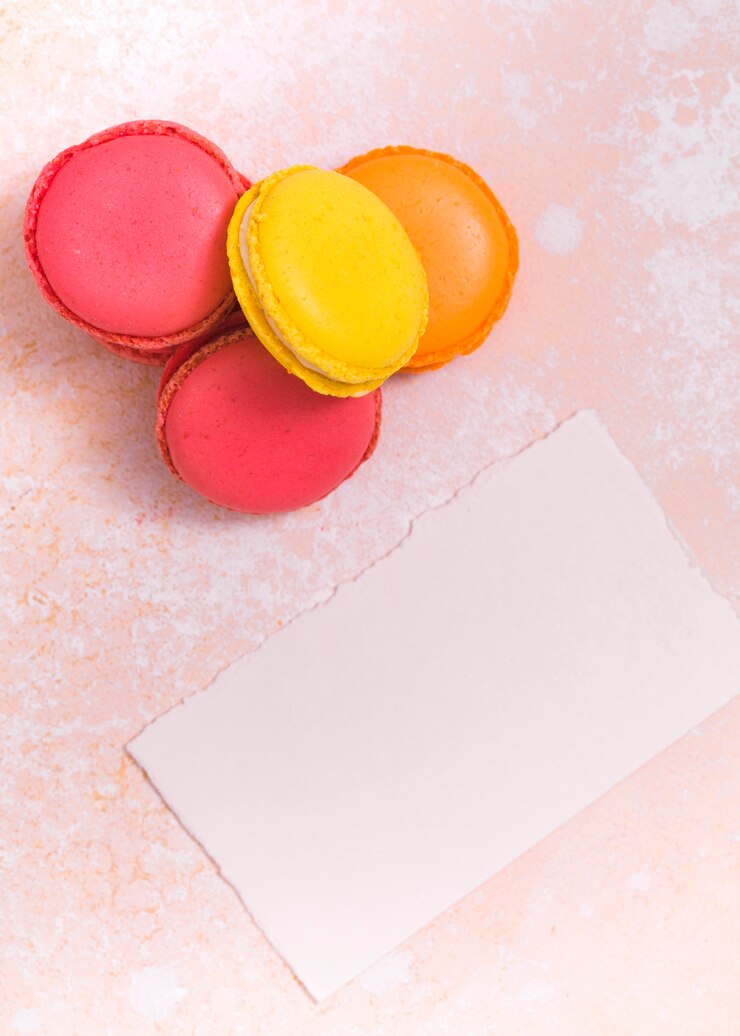 Free Photo vibrant cupcake and torn white paper on grunge background