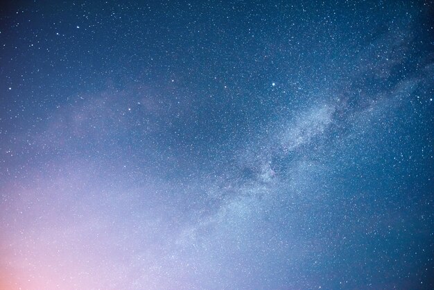 Vibrant night sky with stars and nebula and galaxy.