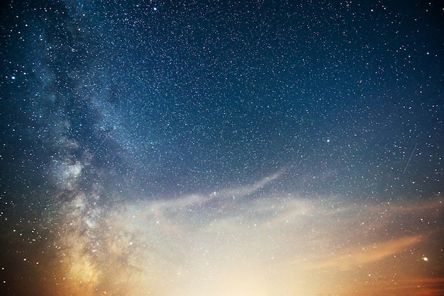 Free photo vibrant night sky with stars and nebula and galaxy.