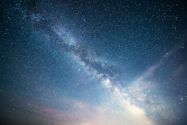 Vibrant night sky with stars and nebula and galaxy.