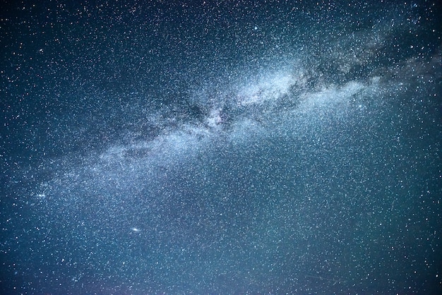 Vibrant night sky with stars and nebula and galaxy.