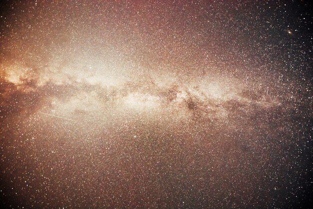 Vibrant night sky with stars and nebula and galaxy.