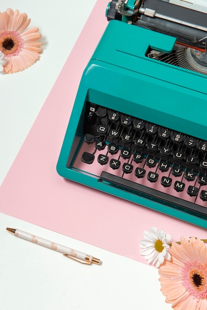 Free photo vibrantly colored retro typewriter with keyboard and buttons