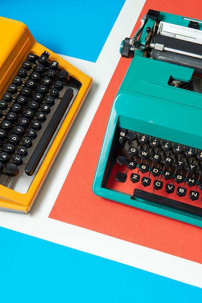 Free photo vibrantly colored retro typewriter with keyboard and buttons