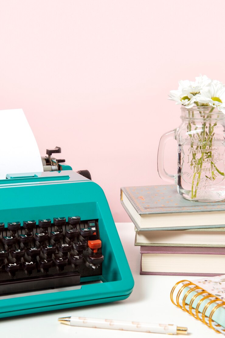Free Photo vibrantly colored retro typewriter with keyboard and buttons