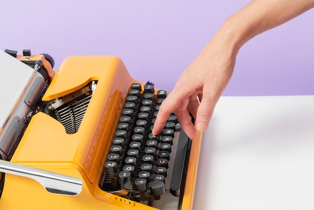 Free photo vibrantly colored retro typewriter with keyboard and buttons