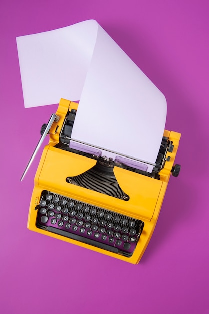 Vibrantly colored retro typewriter with keyboard and buttons