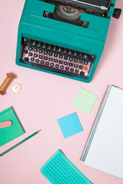 Vibrantly colored retro typewriter with keyboard and buttons