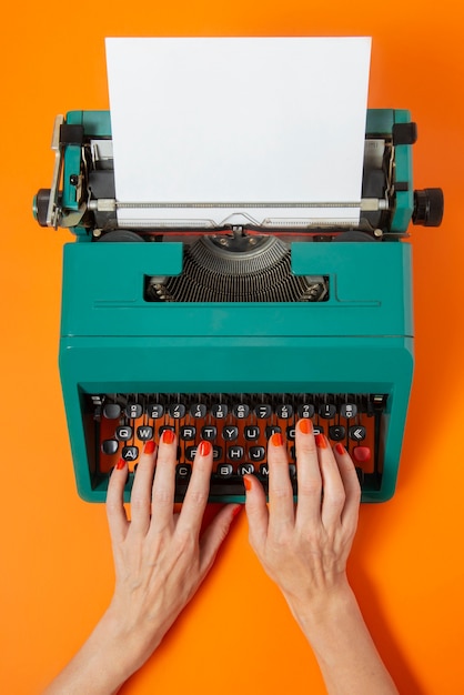 Vibrantly colored retro typewriter with keyboard and buttons