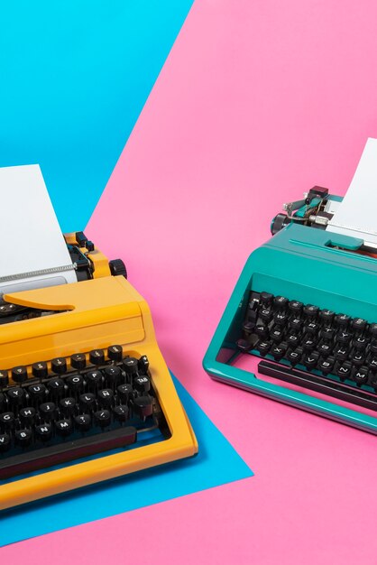 Vibrantly colored retro typewriter with keyboard and buttons