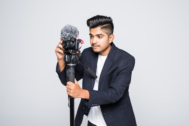 Video camera indian operator isolated on a white background