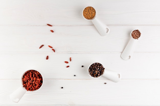 Above view arrangement with food on wooden background