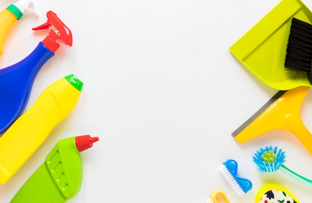 Above view assortment with cleaning products on white background