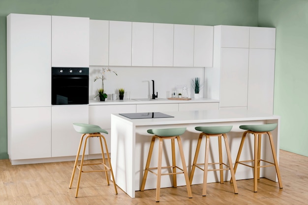 View of a beautifully decorated green kitchen