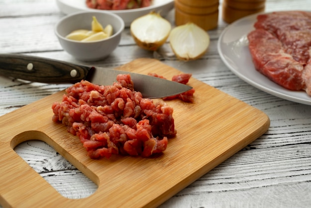 View of beef meat for steak tartar dish