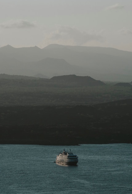 View of a boat cruising at the Galápagos Islands