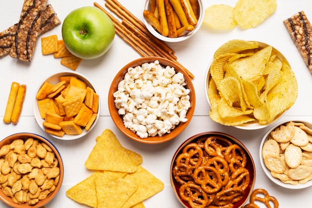 Free photo above view bowl with salty snacks