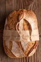 Free photo above view bread on wooden table