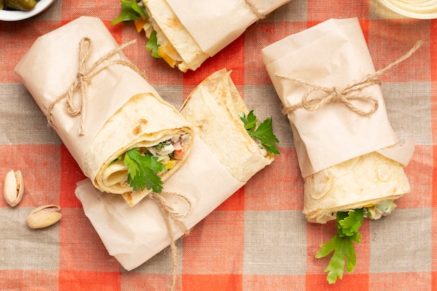 Above view burritos on tablecloth