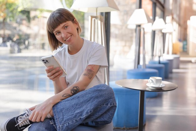 Free photo view of cute woman smiling at camera