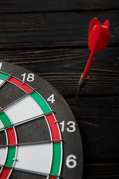 Free photo view of dartboard with arrow