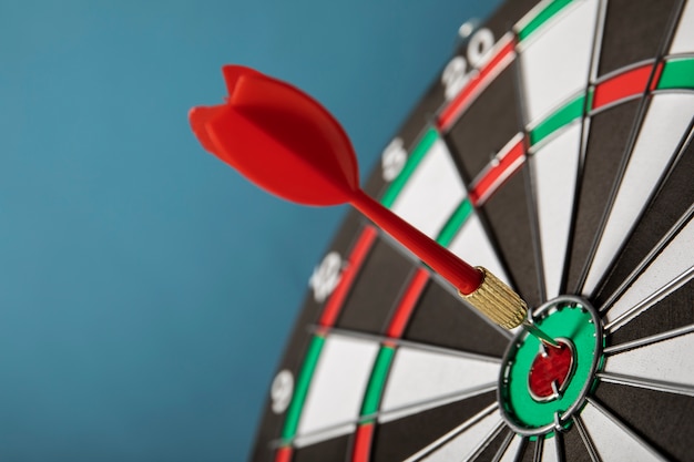 Free photo view of dartboard with bullseye arrow points