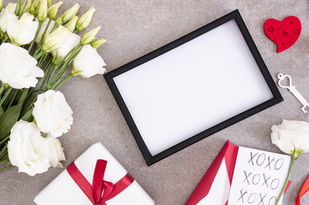 Above view decoration with frame and flowers