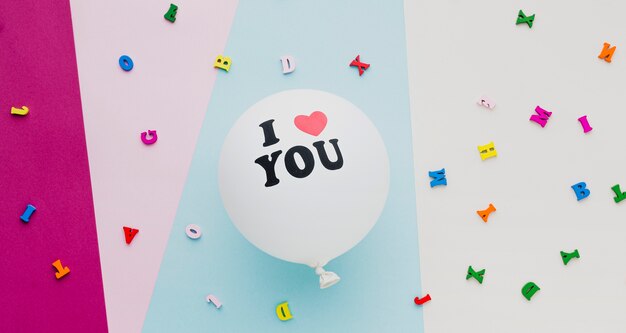 Above view decoration with white balloon and confetti