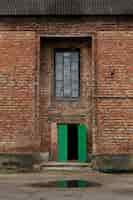 Free photo view of deserted and decaying house in nature