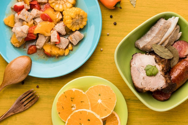 Above view dish with meat and corn