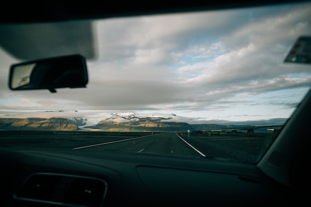 View on empty icelandic road from inside car