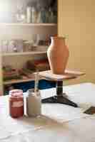 Free photo view of essentials in a pottery studio