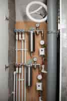 Free photo view of exposed plumbing pipes