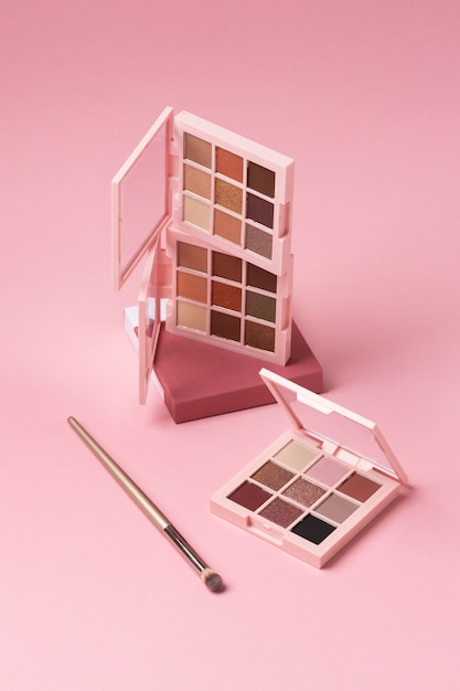 View of eyeshadow palette with brush applicator