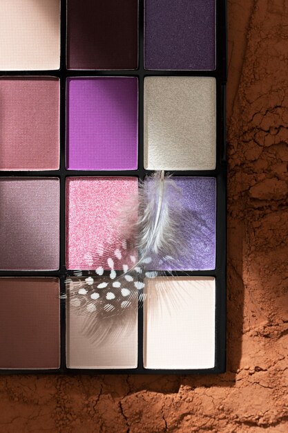 View of eyeshadow palette with cosmetic powder