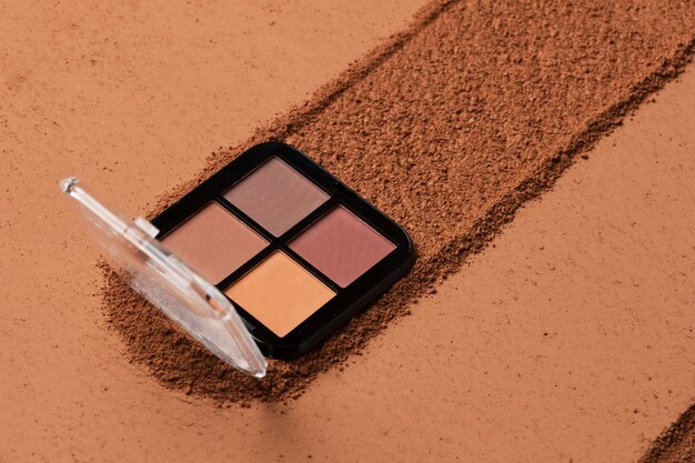 view of eyeshadow palette with cosmetic powder