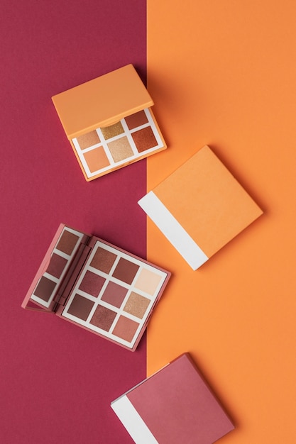 Free photo view of eyeshadow palette with shades of cosmetic powder