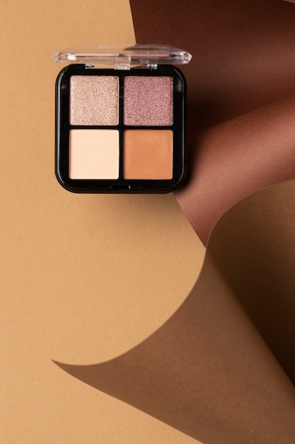 View of eyeshadow palette with shades of cosmetic powder