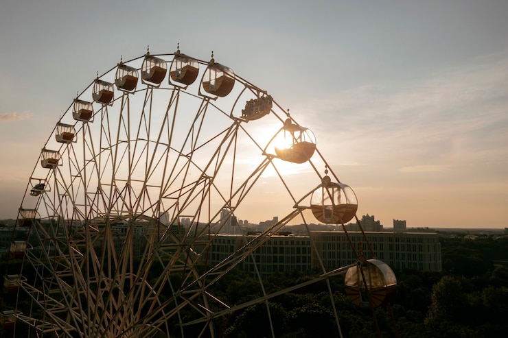 Free Photo view of the ferris wheel in the city