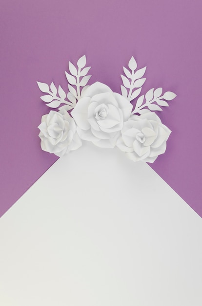 Free photo above view floral assortment with purple background