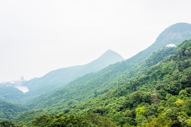 view of foggy mountain landscape at sunrise