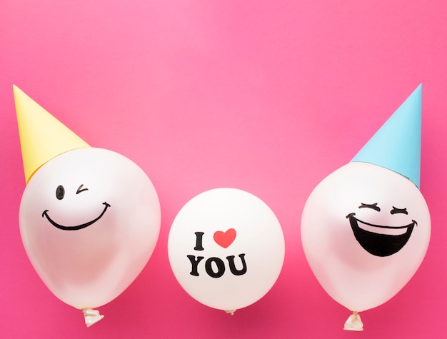 Free photo above view frame with cute balloons