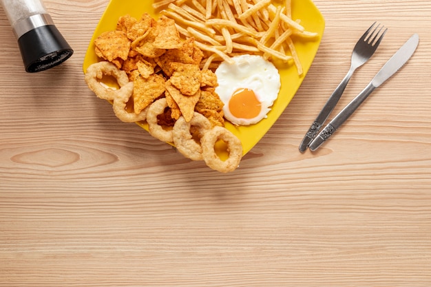 Above view frame with eggs and fries