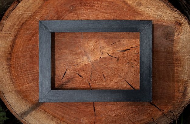 Above view frame on wooden background