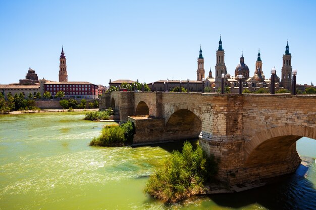 view from Ebro river. Stone bridge and Cathedral
