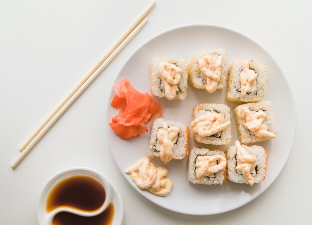 View from above sushi plate with sauce