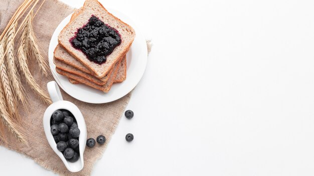 Above view fruit jam on bread