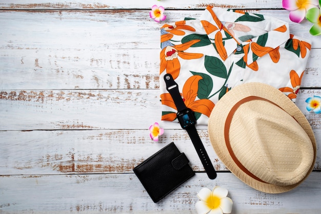 View of hawaiian shirt with hat and wallet