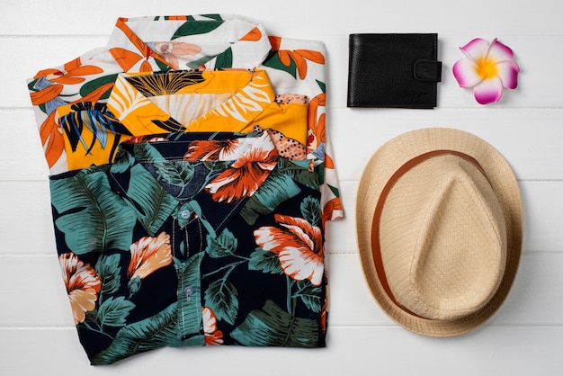 View of hawaiian shirts with hat and wallet